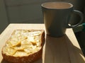 Bread with magarine topping and hot drink Royalty Free Stock Photo