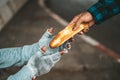 The bread-makers gave to the beggars who sat on the side of the road