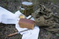 Bread and military flask on a white towel