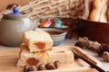 Bread with milk tea custard and hot tea. Royalty Free Stock Photo