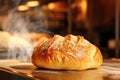 Bread in the oven at a bakery. Production and baking of fresh bread. Industrial furnace. Baking bread. Fire, smoke and steam. Royalty Free Stock Photo