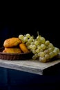 Bread with paprika and golden grapes Royalty Free Stock Photo