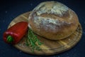 Bread, pepper and thyme presented on a tray