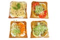 Bread pieces with delicious cod caviar and vegetables on white background