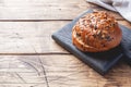 Bread products with cereals and seeds on a wooden background. Lean healthy buns, carbohydrate pastries. Copy space Royalty Free Stock Photo