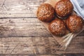 Bread products with cereals and seeds on a wooden background. Lean healthy buns, carbohydrate pastries. Copy space Royalty Free Stock Photo