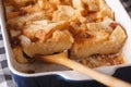 Bread pudding with raisins macro in baking dish. horizontal Royalty Free Stock Photo