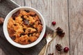 Bread pudding in a white ramekin top view