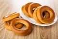 Bread rings baranka in dish, bread rings on wooden table Royalty Free Stock Photo