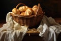 bread rolls in a wicker basket with a linen cloth Royalty Free Stock Photo