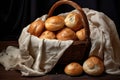 bread rolls in a wicker basket with a linen cloth Royalty Free Stock Photo