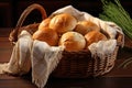 bread rolls in a wicker basket with a linen cloth Royalty Free Stock Photo