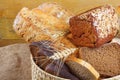 Bread from rye and wheat flour of rough grinding in wicker basket Royalty Free Stock Photo