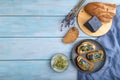 Bread sandwiches with blue lavender cheese and mustard microgreen on blue, top view, copy space Royalty Free Stock Photo