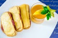 Bread with sausage and cheese and tea Royalty Free Stock Photo