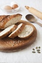 Bread with seeds on a wooden board