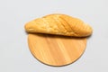 Bread and slice of bread,wooden background for design Royalty Free Stock Photo