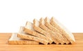 Bread slice on wooden table isolated in white background Royalty Free Stock Photo