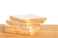 Bread slice on wooden table isolated in white background Royalty Free Stock Photo