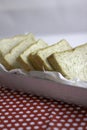 Bread Slices Arrangement with Red and White Polkadot Background