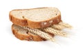 Bread slices with wheat ears in between on white background Royalty Free Stock Photo