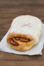 Bread with smoked sausage on white plate Royalty Free Stock Photo