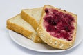 Bread with spread jam on the wooden dish Royalty Free Stock Photo