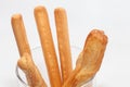 Bread stick on cup isolated on white Royalty Free Stock Photo