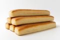 Bread sticks with butter on a white background Royalty Free Stock Photo