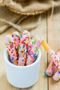 Bread sticks with chocolate and colorful sprinkles for children, Snack for kids