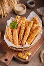 Bread sticks grissini with sesame seeds and cumin. Savory snack