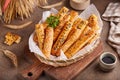 Bread sticks grissini with sesame seeds and cumin. Savory snack
