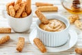 Bread sticks with sesame seeds with mustard and honey dip sauce