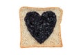Bread with sweet blackberry jam in shape of heart on white background with clipping path. Royalty Free Stock Photo