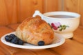 Bread texture close up. Fresh bread bun with tea close-up. Royalty Free Stock Photo