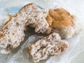 Bread thrown in the trash, waste of bread, stale piece of bread, Royalty Free Stock Photo