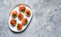 Bread toast with butter and salmon for a snack. Breakfast. Fish canapes on the table Royalty Free Stock Photo