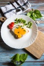 Bread toast and egg poach with ingredients on a white plate Royalty Free Stock Photo