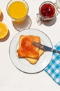 Bread toast with orange juice and jam on white background Royalty Free Stock Photo