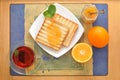 bread toast with orange marmalade. black tea with mint and oranges on the tray. Breakfast in the morning. top view Royalty Free Stock Photo