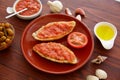 Bread toasted slices with grated tomato