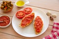 Bread toasted slices with grated tomato