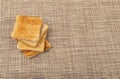 Bread Toasts on Rustic Background, Toasted Sandwich Square Slices, Loaf Pieces for Toast on Brown Tablecloth Royalty Free Stock Photo