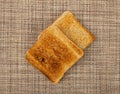 Bread Toasts on Rustic Background, Toasted Sandwich Square Slices, Loaf Pieces for Toast on Brown Tablecloth Royalty Free Stock Photo