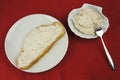 Bread of tuna spread on white plate and bowl