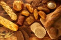 Bread varied mix on golden aged wood table Royalty Free Stock Photo