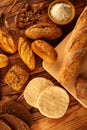 Bread varied mix on golden aged wood table Royalty Free Stock Photo