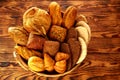 Bread varied mix on golden aged wood table Royalty Free Stock Photo