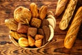 Bread varied mix on golden aged wood table Royalty Free Stock Photo