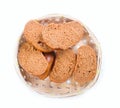 Bread in a wicker breadbasket on white background Royalty Free Stock Photo